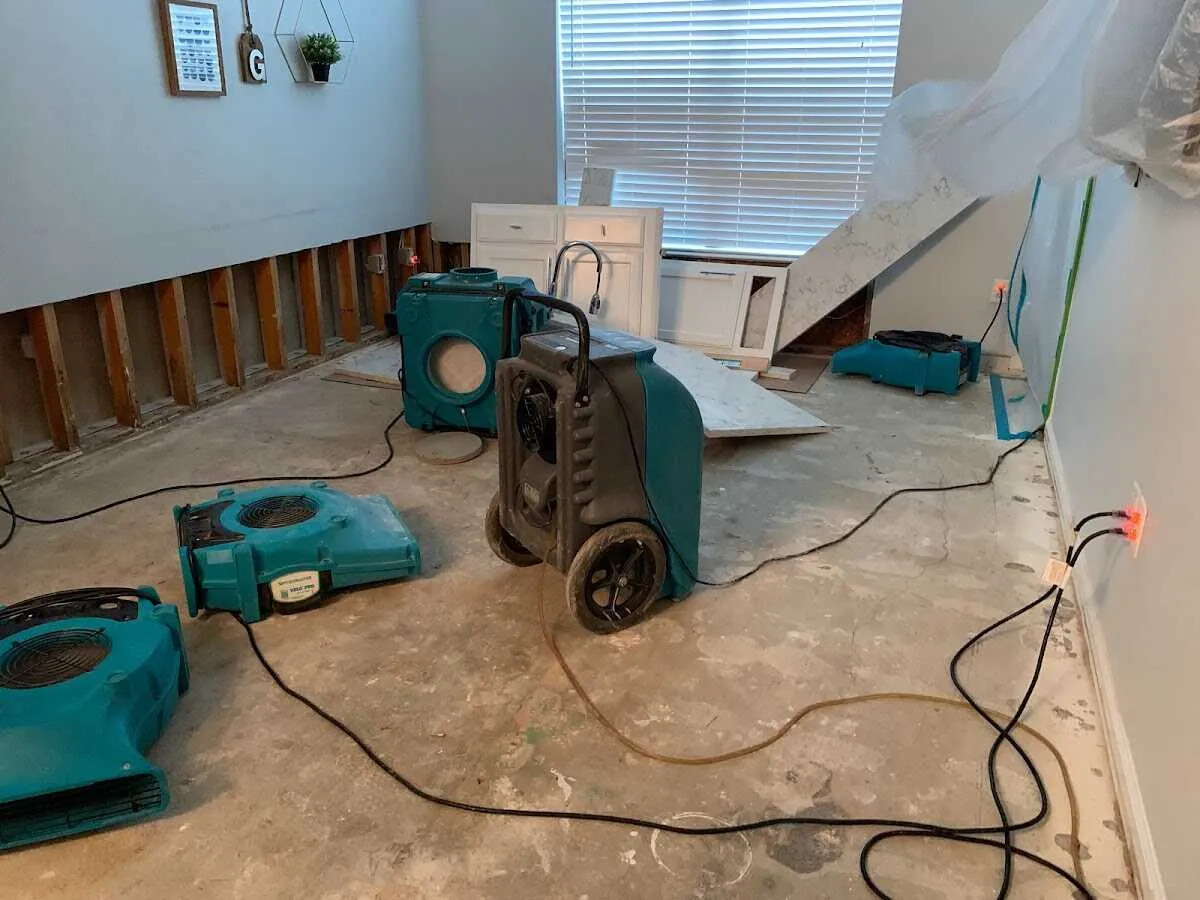 Dehumidifier in flood-cut room for Water Damage Restoration in Sunbury